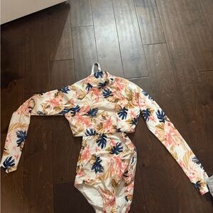 New with tags Ripcurl one piece swim suit .